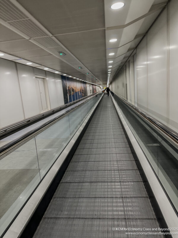 a moving walkway in a building