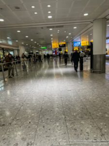 people walking in a large airport