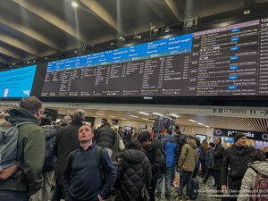 a group of people in a terminal