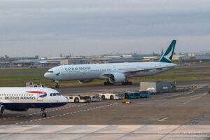 a large white airplane on a runway