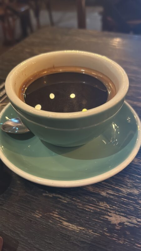 a cup of coffee on a saucer