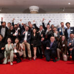 a group of people posing for a photo