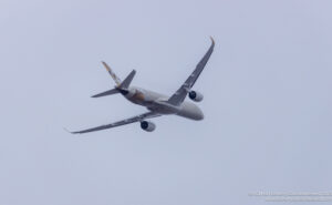 a plane flying in the sky