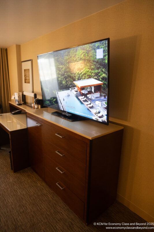 a television on a dresser