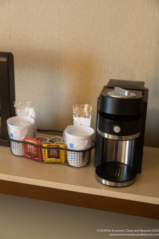 a coffee machine and coffee cups on a table