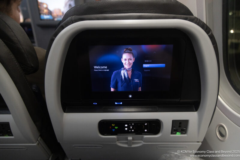 a screen on the back of a seat