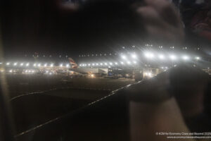 an airplane at an airport at night