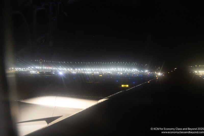 an airplane wing at night