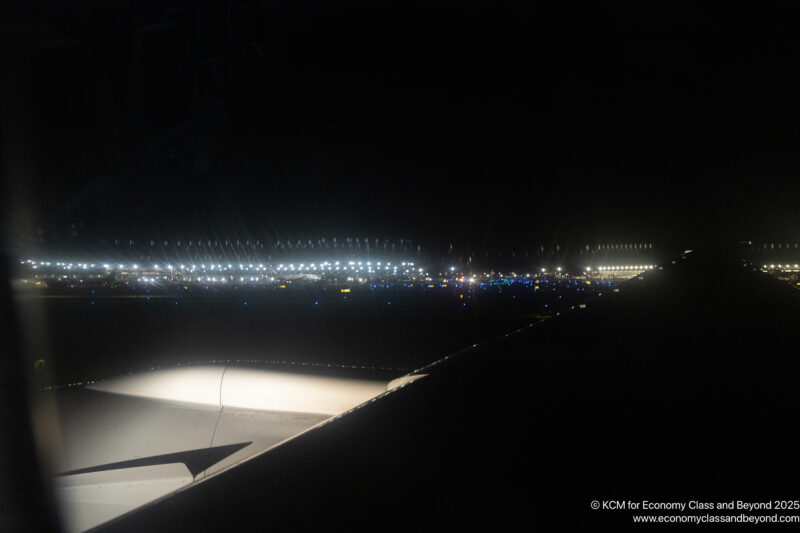 an airplane wing at night