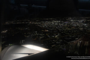 a city at night from an airplane