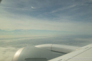 an airplane wing in the sky