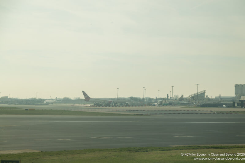 an airport with an airplane on the runway