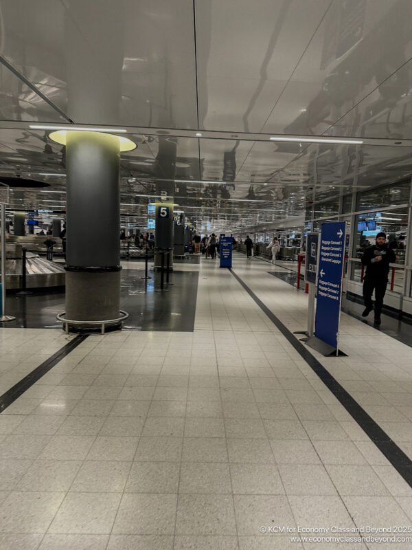 a group of people walking in a terminal