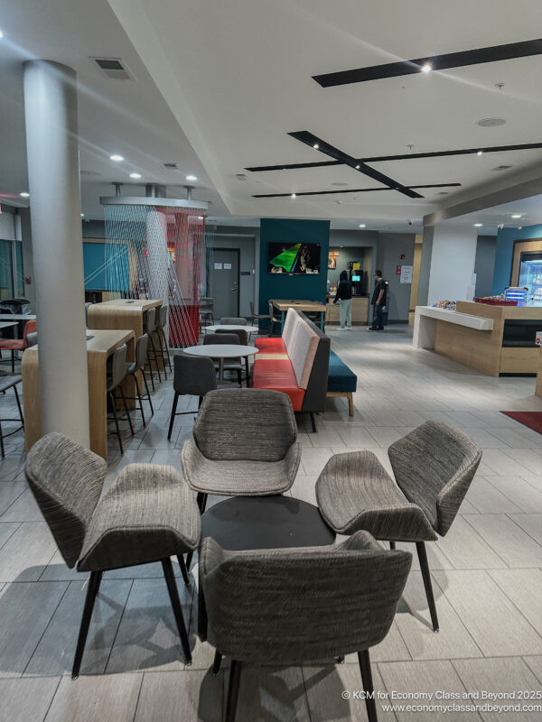 a room with chairs and tables