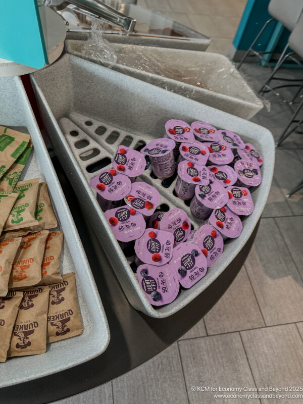 a group of purple yogurts in a container