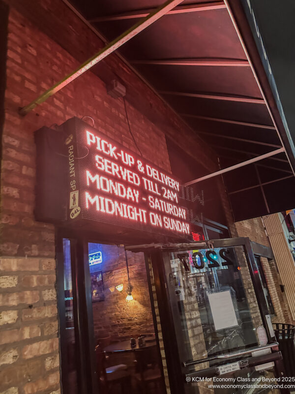 a sign on a brick building