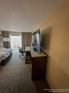 a room with a television and a bed