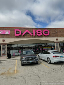 a building with cars parked in front of it