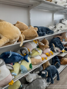 a shelf with stuffed animals
