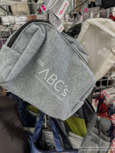 a grey bag from a wire rack