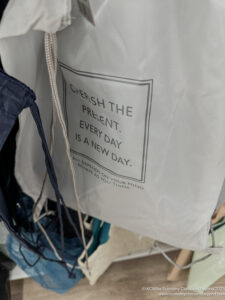 a white bag with black text on it