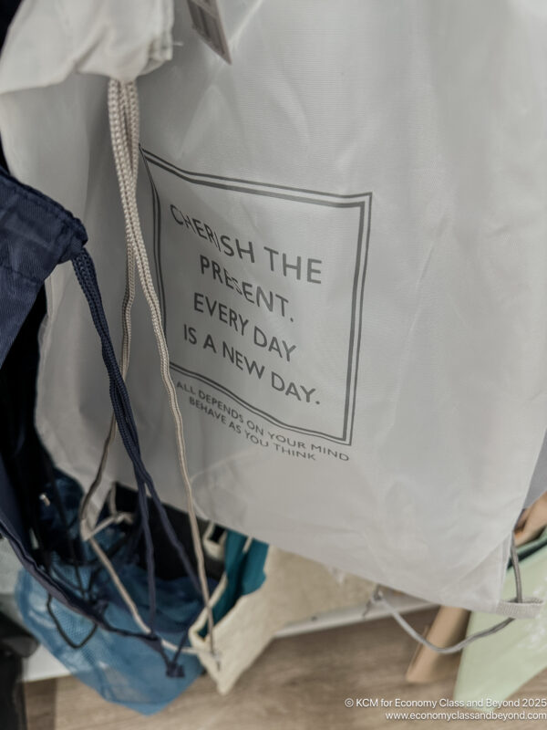 a white bag with black text on it