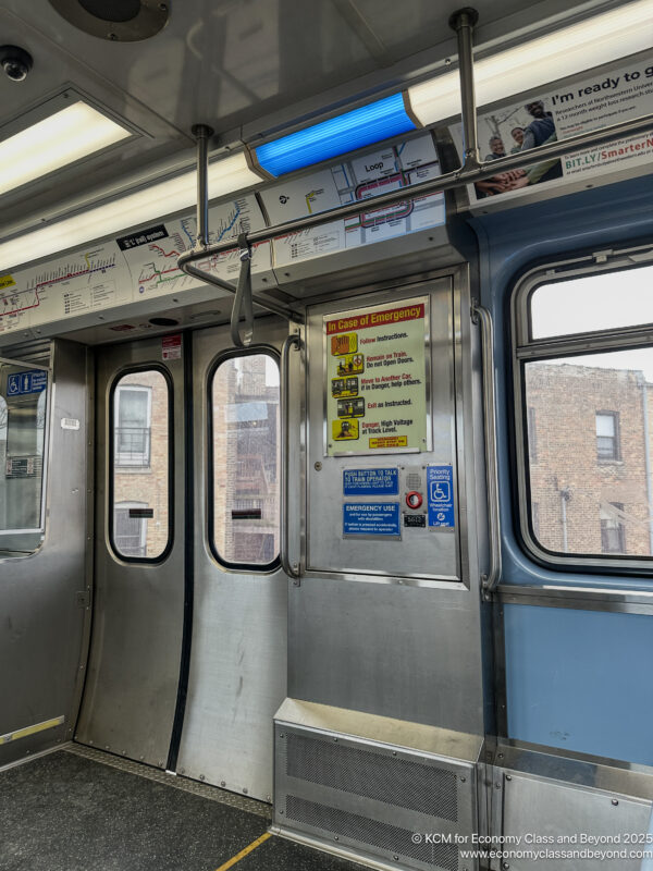 a subway car with a sign on the door