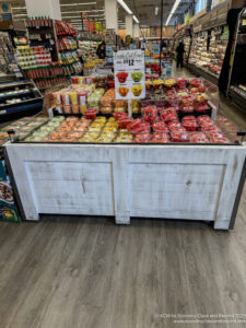 a display of fruit in a grocery store