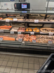 a display case with different types of meat