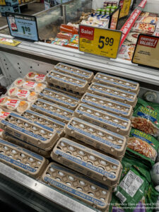 a shelf with eggs in it