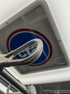 a metal handle on a sign