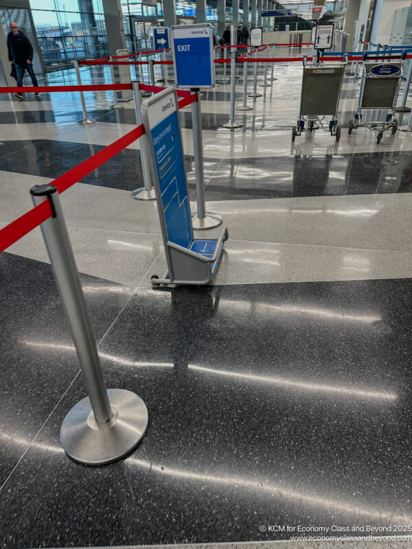 a red rope around a sign