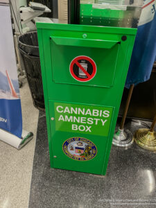 a green box with a sticker on it