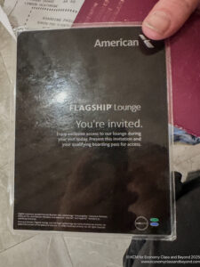 a black card with white text and blue and green text