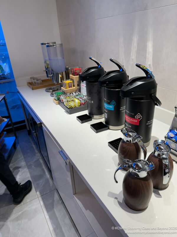 a group of coffee containers on a counter