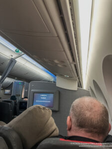 a man sitting on an airplane