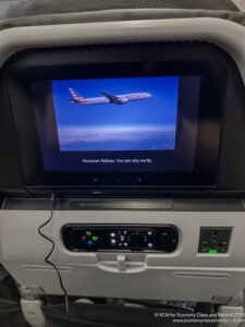 a screen on the back of an airplane
