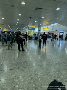 people in a large airport terminal