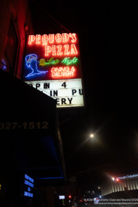 a sign with neon lights