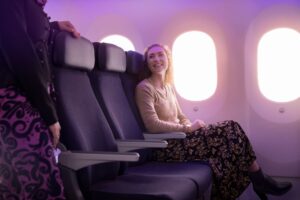 a woman sitting in an airplane