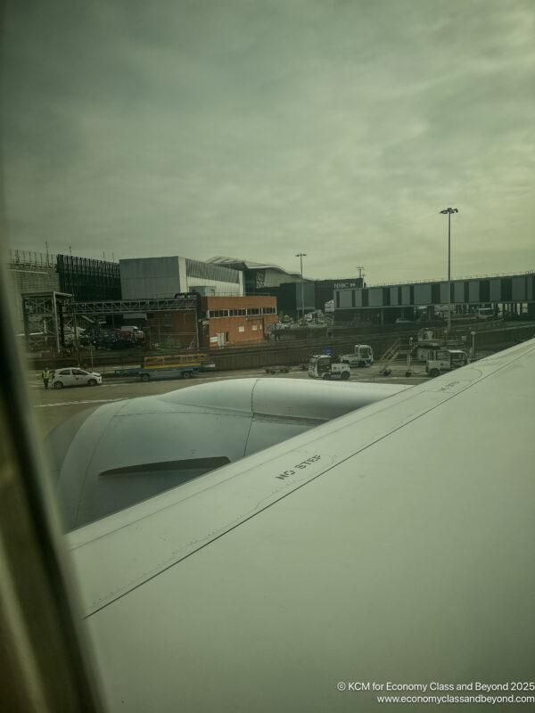 a view of a runway from an airplane window