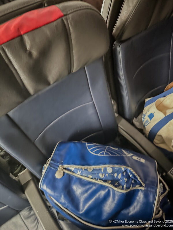 a blue bag on a chair