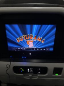 a tv on the back of a plane