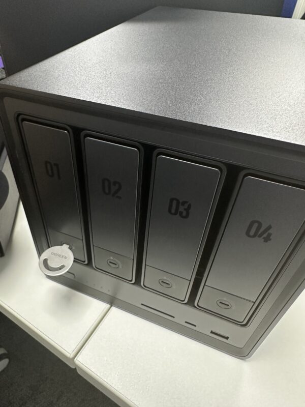 a black box with four rectangular buttons