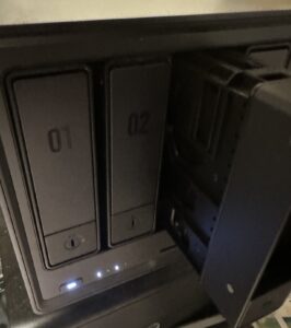 Inserting the populated drive into the NAS