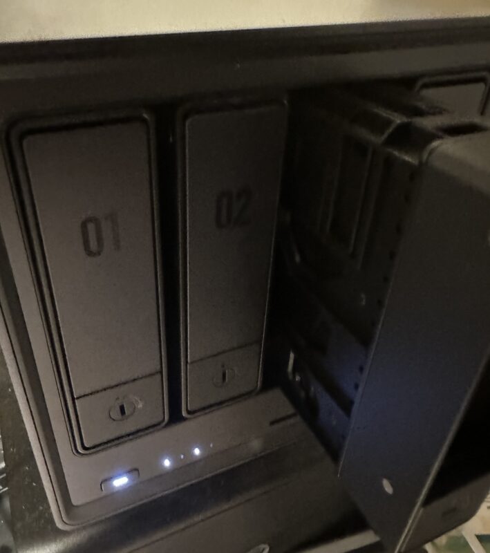a black computer tower with two rectangular boxes