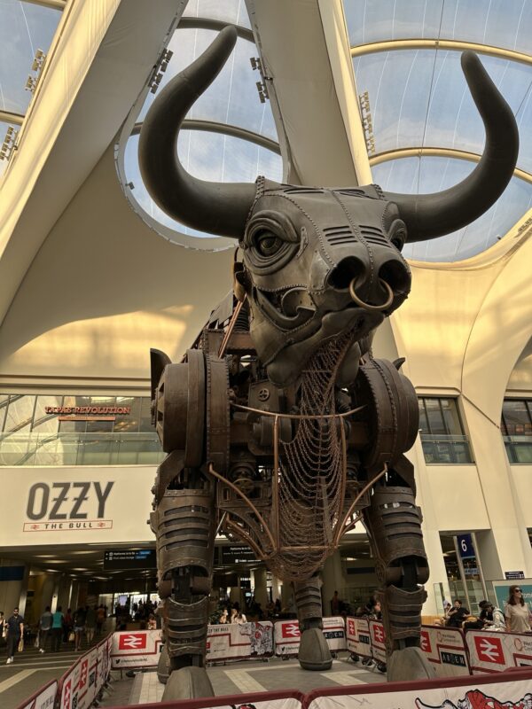 a statue of a bull in a building