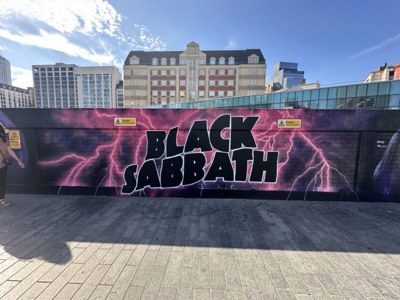a wall with a sign painted on it