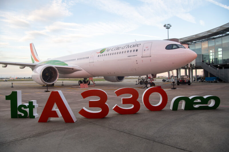 a large white airplane on the ground