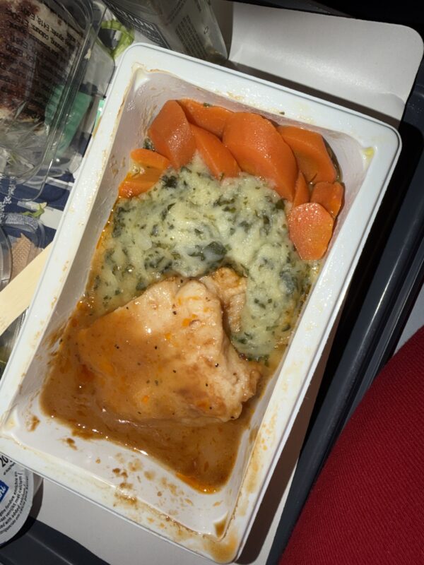 a white container with food in it